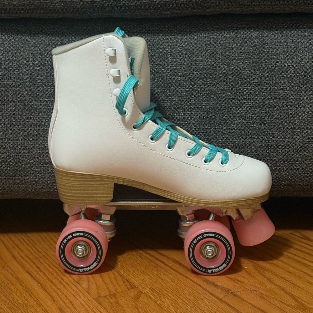 White Impala Roller Skates with pink wheels